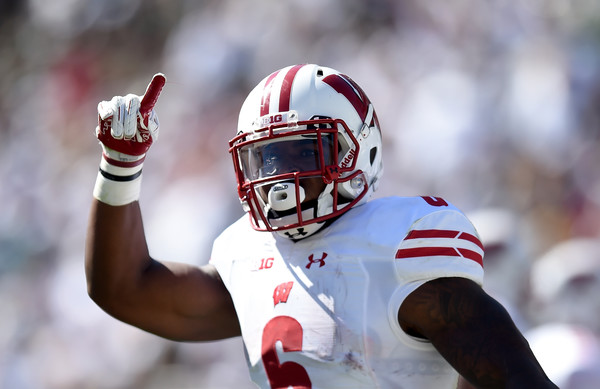 Corey Clement carried the ball 35 times against Iowa for 134 yards, but he earned every yard in this physical win for the Badgers. (Bobby Ellis/Getty Images North America)